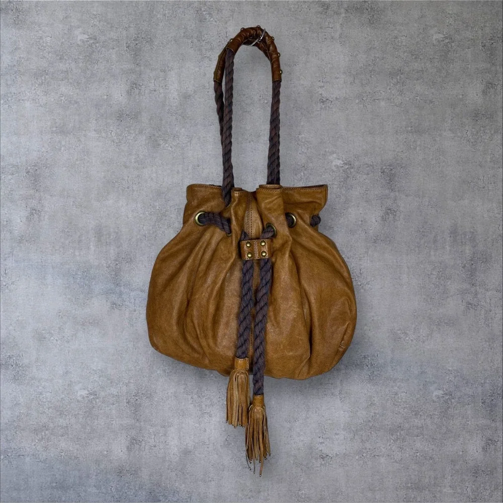 Anthropologie Lucky Penny Brown Leather Hobo Bucket Bag Rope Tassels Boho Studs